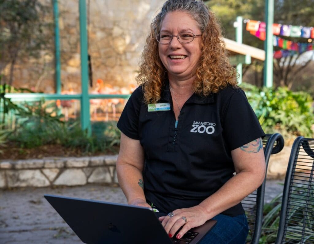 San Antonio zoo employee working at her desk.