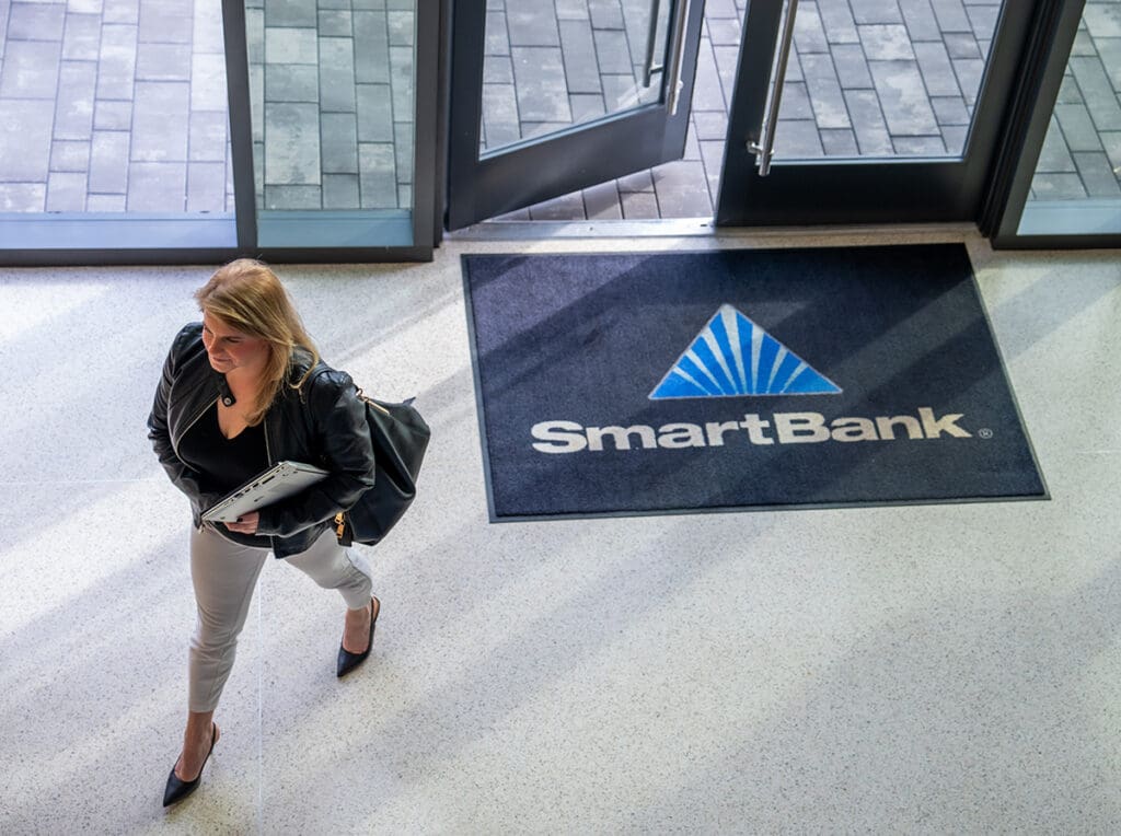 SmartBank employee walking into the bank.