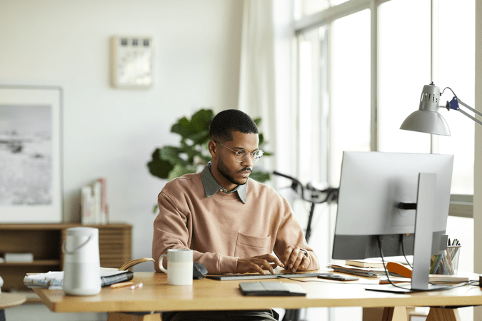 man working at desk