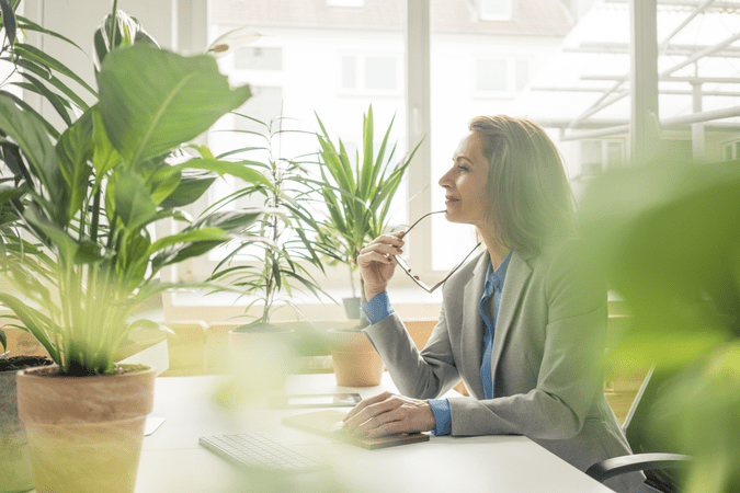 woman sitting at desk at work