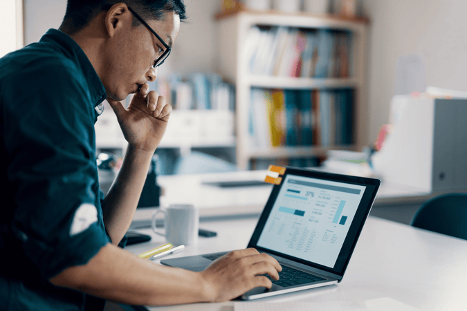 man working at laptop