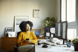 woman sitting at desk in a home office