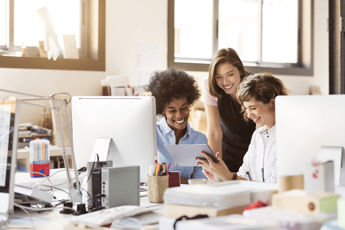 women collaborating at work