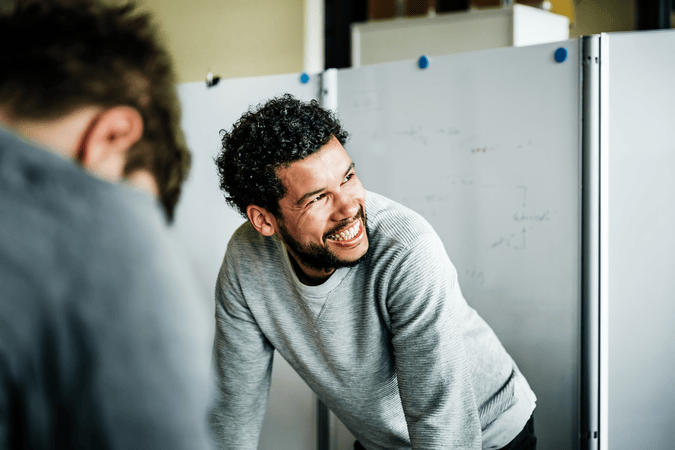 man smiling at work