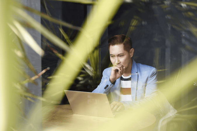 man working at laptop